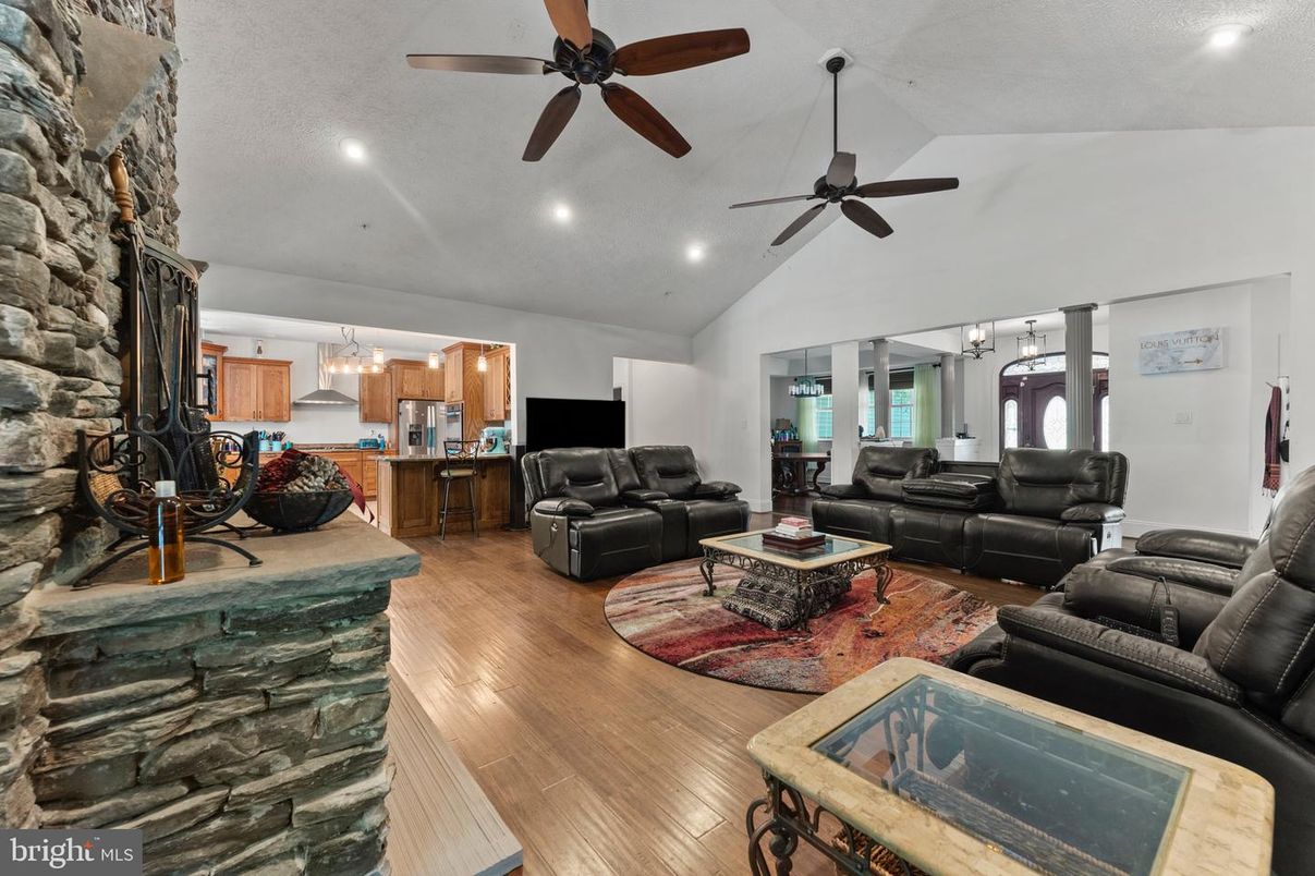 Fireplace, Interior, Kitchen, Living room, Pendant Lights, Recessed Lighting, Stone Walls, Wood Texture Flooring