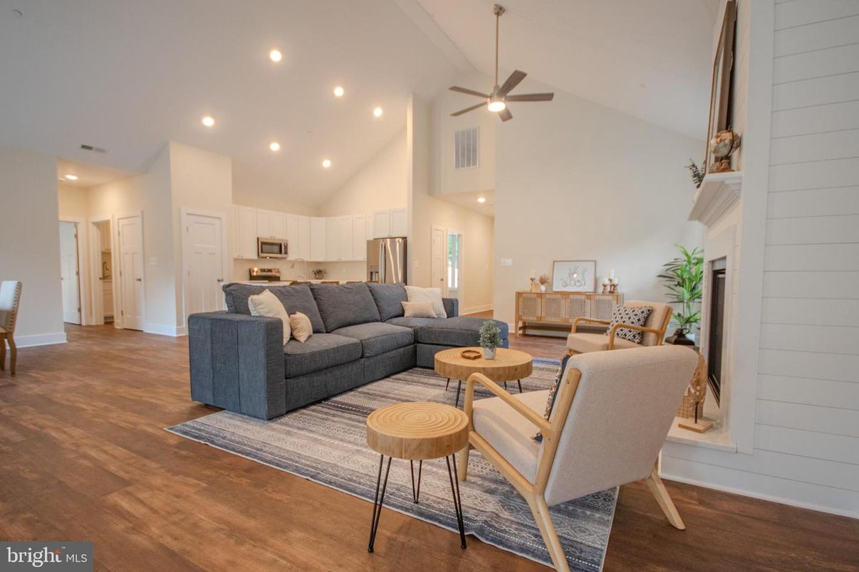 Fireplace, Interior, Kitchen, Living room, Recessed Lighting, Stainless Steel Appliances, Wood Texture Flooring
