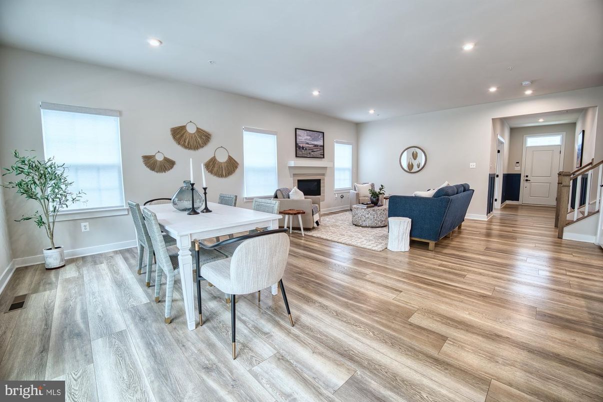 Dining room, Fireplace, Interior, Living room, Recessed Lighting, Wood Texture Flooring