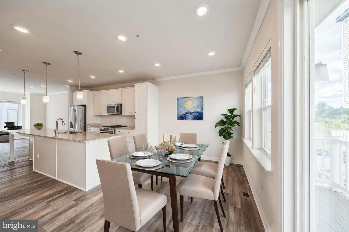 Dining room, Interior, Kitchen, Pendant Lights, Recessed Lighting, Stainless Steel Appliances, Wood Texture Flooring