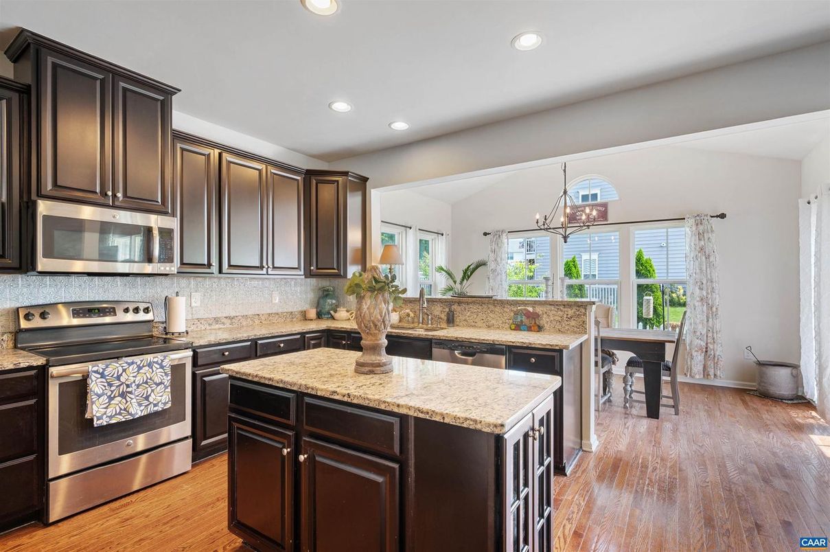 Chandelier, Interior, Kitchen, Pendant Lights, Recessed Lighting, Stainless Steel Appliances, Wood Texture Flooring