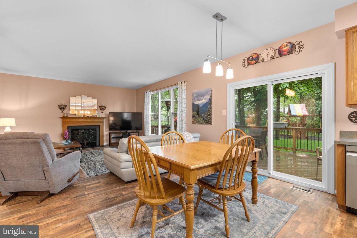 Dining room, Fireplace, Interior, Living room, Pendant Lights, Wood Texture Flooring