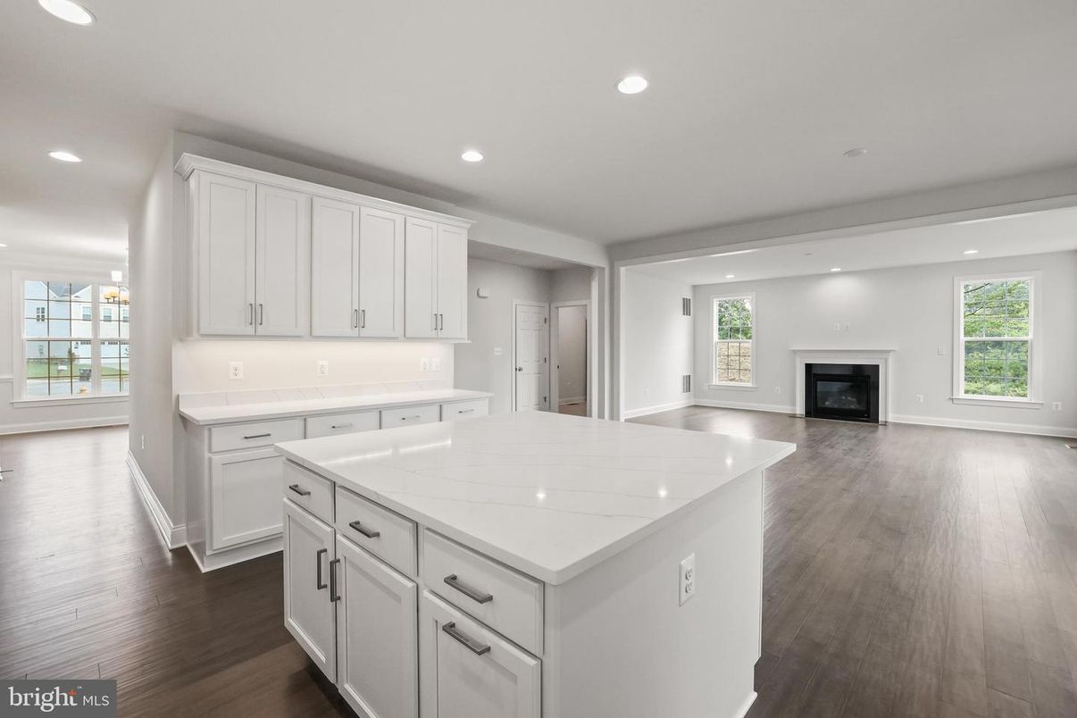 Empty room, Fireplace, Interior, Kitchen, Recessed Lighting, Wood Texture Flooring