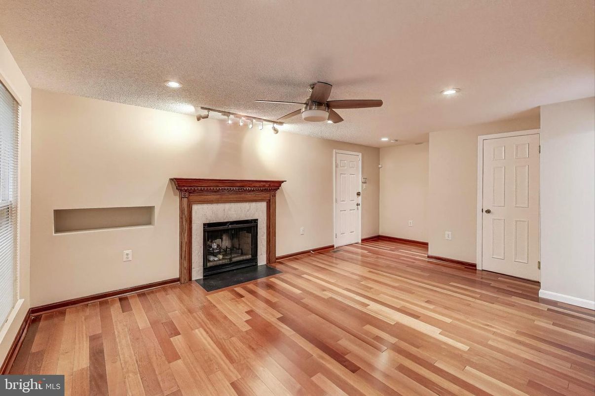 Empty room, Fireplace, Interior, Recessed Lighting, Wood Texture Flooring