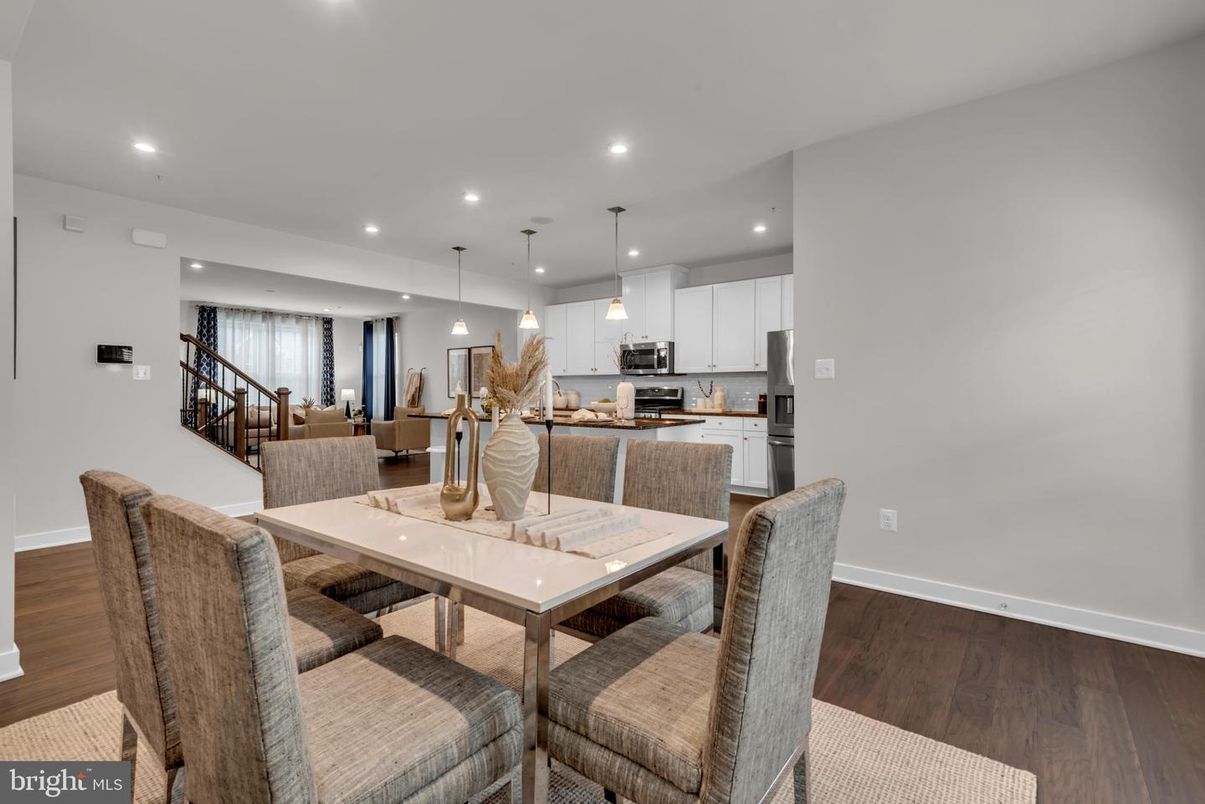 Dining room, Interior, Kitchen, Pendant Lights, Recessed Lighting, Stainless Steel Appliances, Wood Texture Flooring