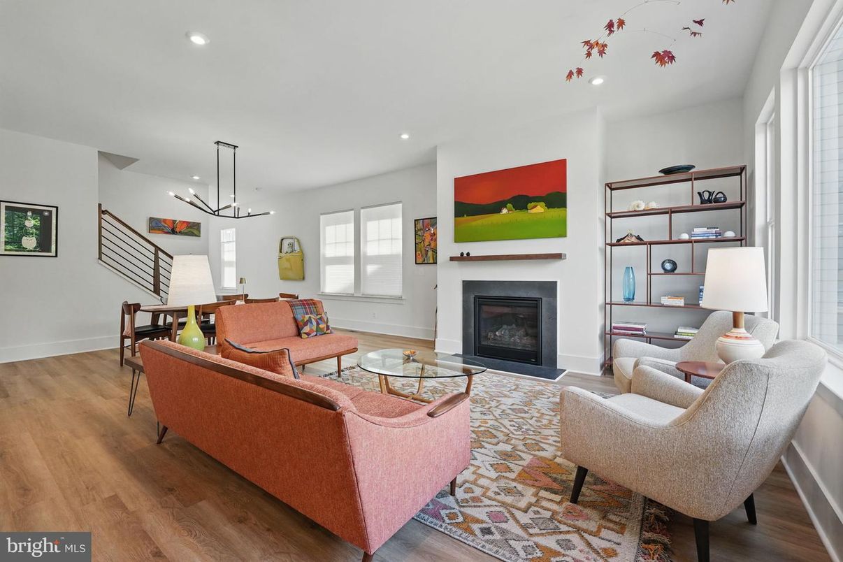 Dining room, Fireplace, Interior, Living room, Pendant Lights, Recessed Lighting, Wood Texture Flooring