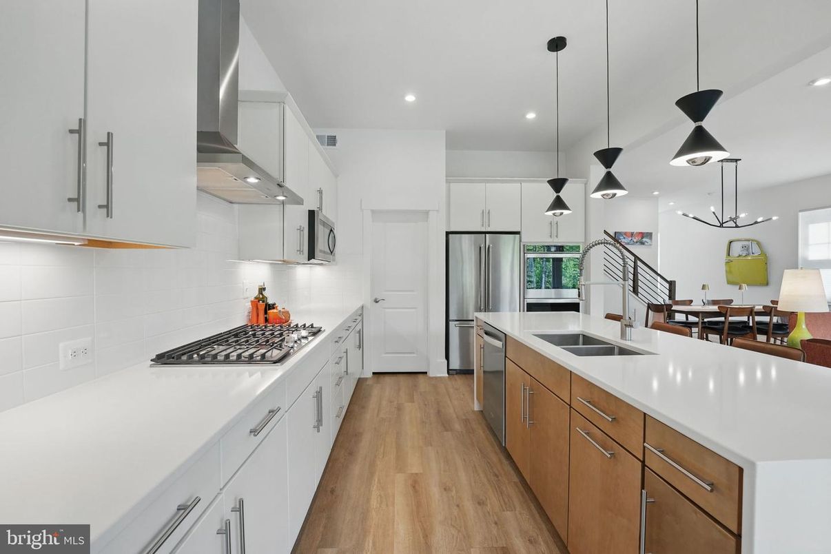 Interior, Kitchen, Pendant Lights, Recessed Lighting, Stainless Steel Appliances, Wood Texture Flooring