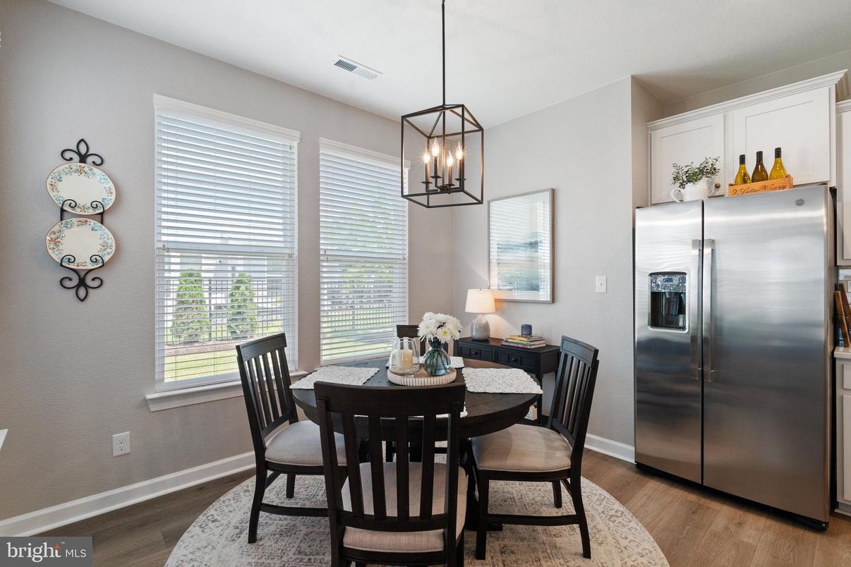 Dining room, Interior, Pendant Lights, Stainless Steel Appliances, Wood Texture Flooring