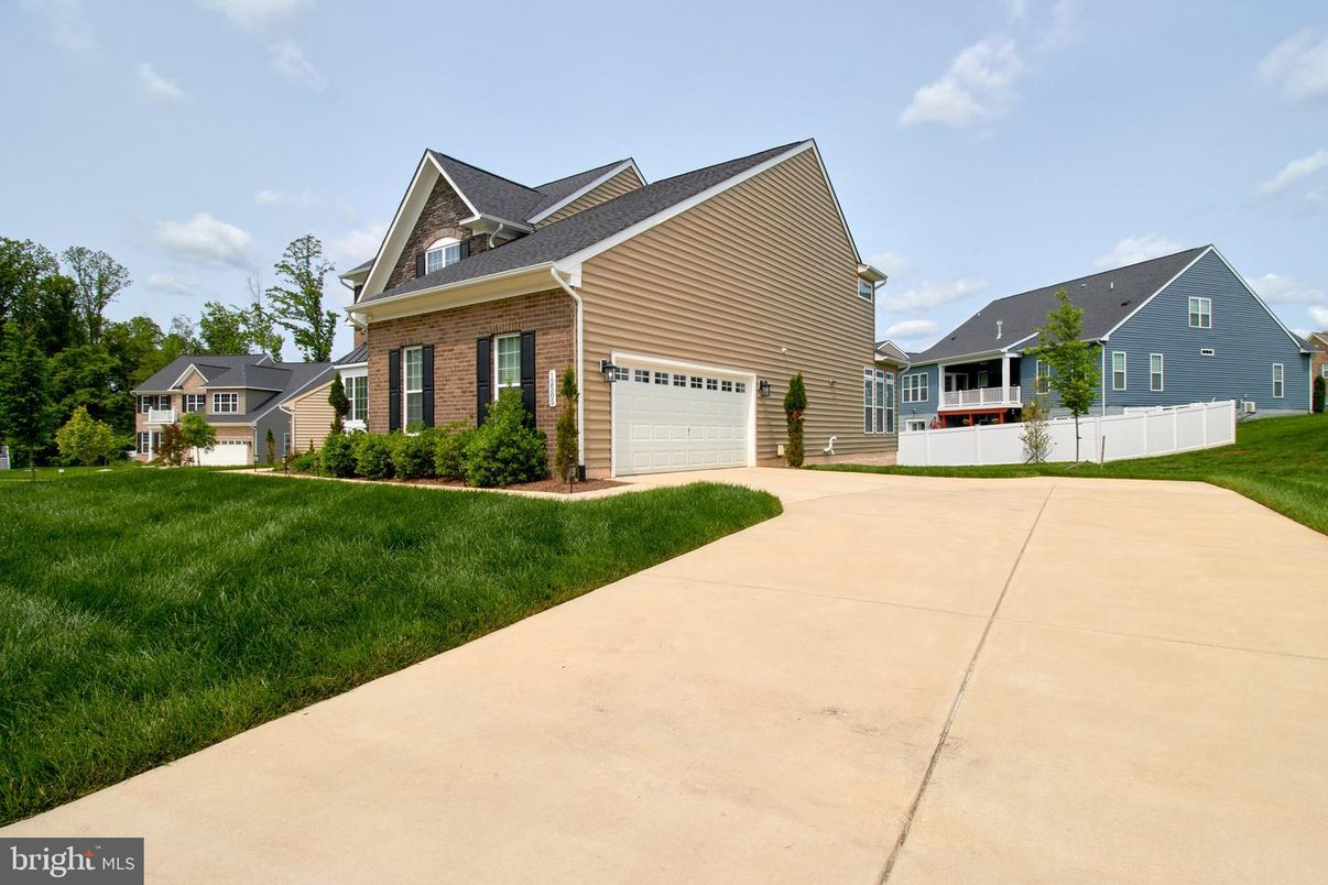 Attached, Backyard, Exterior, Facade, Brick Facade, Farmhouse