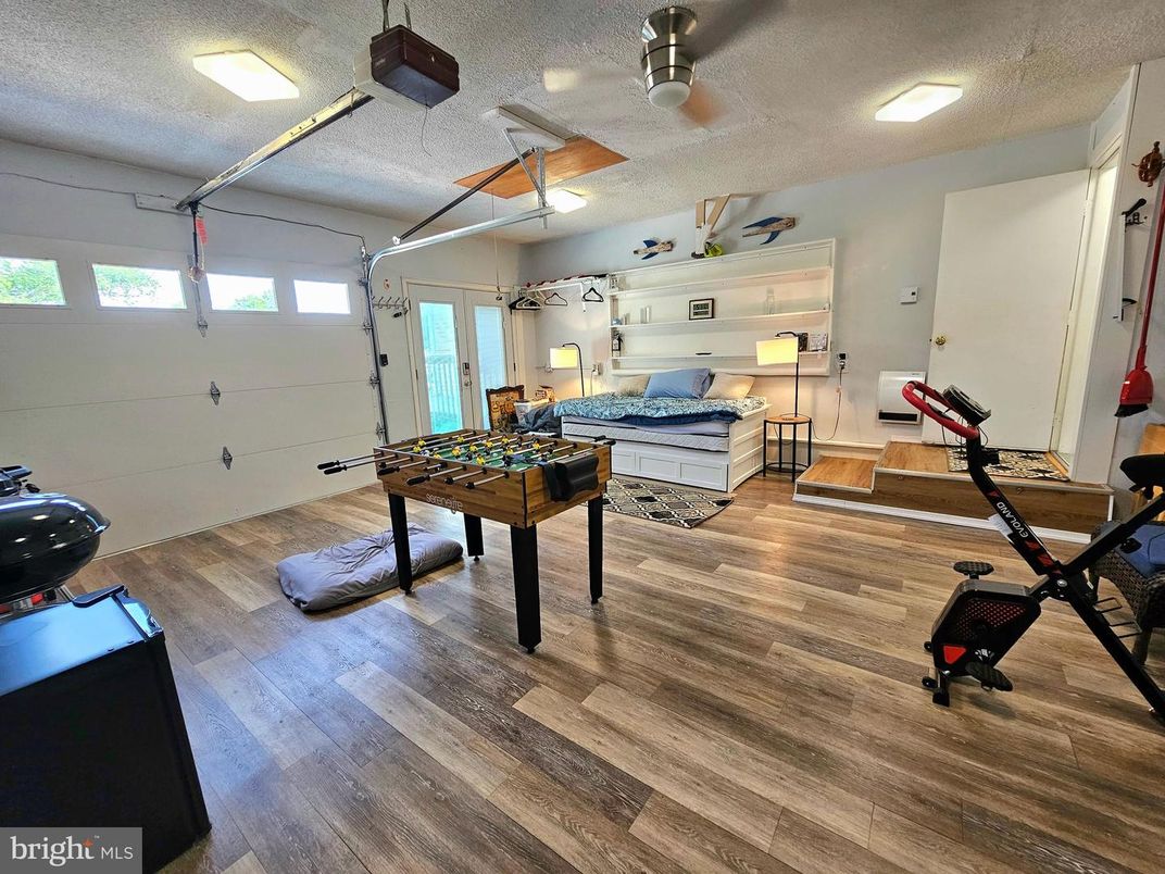 Fitness Equipment, Game Room, Interior, Wood Texture Flooring