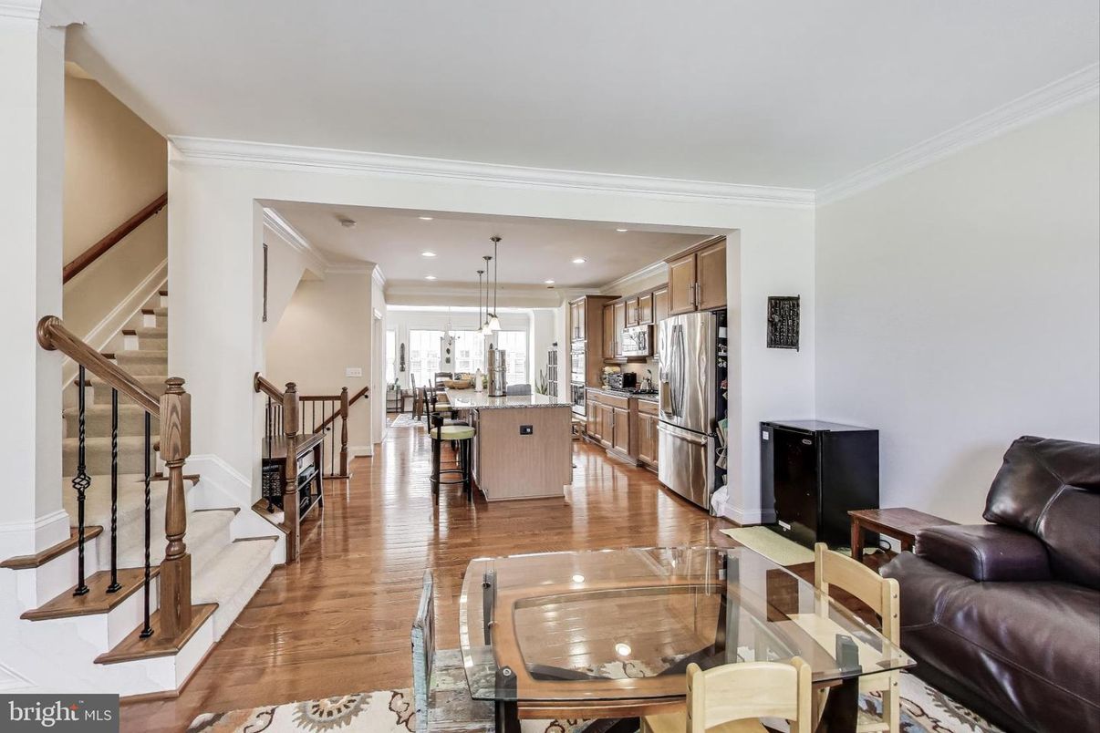 Dining room, Interior, Kitchen, Pendant Lights, Recessed Lighting, Stainless Steel Appliances, Wood Texture Flooring