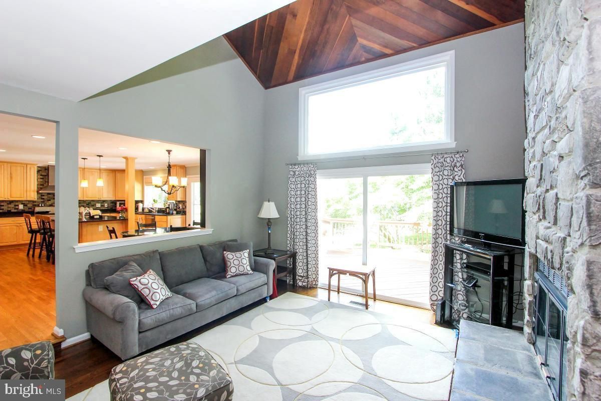 Fireplace, Interior, Kitchen, Living room, Pendant Lights, Recessed Lighting, Stone Walls, Wood Texture Flooring