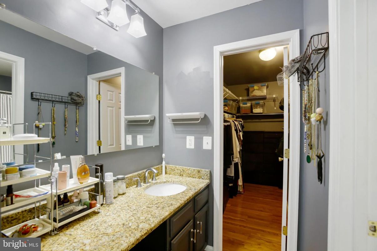 Bathroom, Dual Sink Vanities, Interior, Walk-in Closets, Wood Texture Flooring