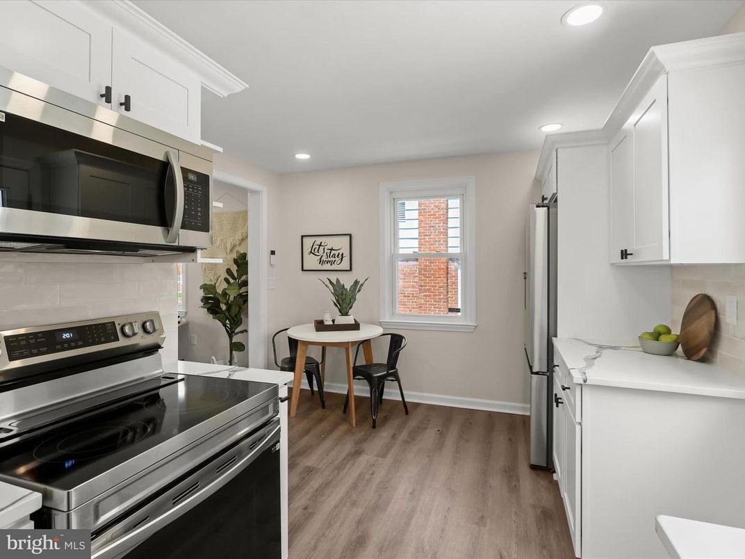 Dining room, Interior, Kitchen, Recessed Lighting, Stainless Steel Appliances, Wood Texture Flooring