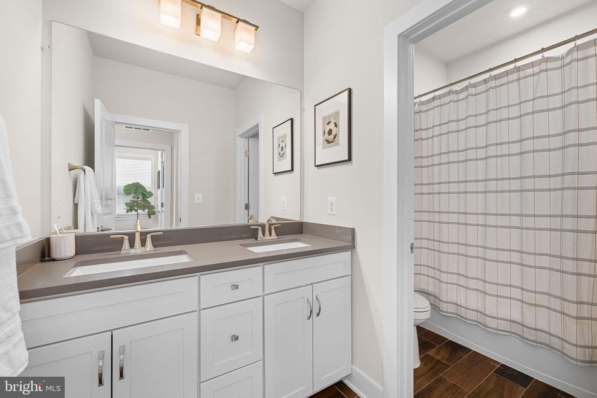 Bathroom, Dual Sink Vanities, Interior, Recessed Lighting, Wood Texture Flooring