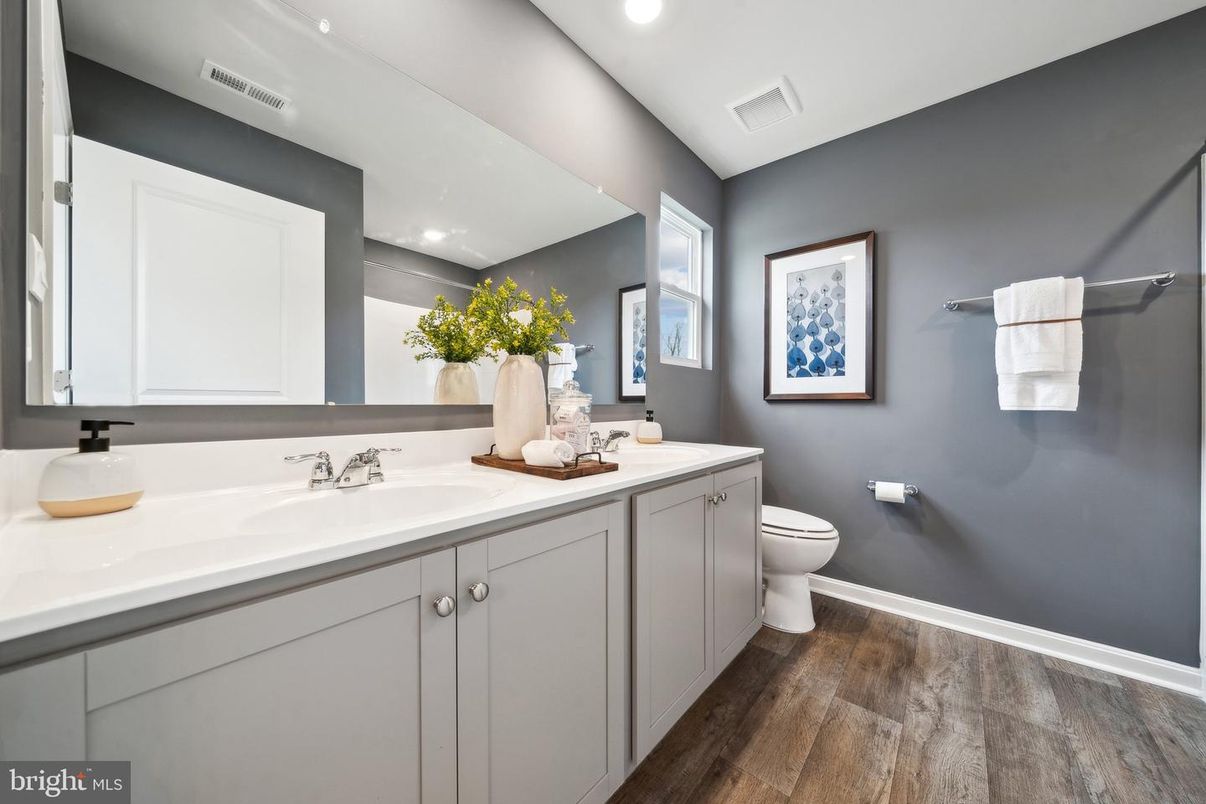 Bathroom, Dual Sink Vanities, Interior, Recessed Lighting, Wood Texture Flooring