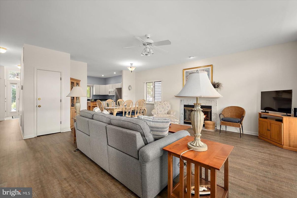 Dining room, Fireplace, Interior, Kitchen, Living room, Recessed Lighting, Wood Texture Flooring