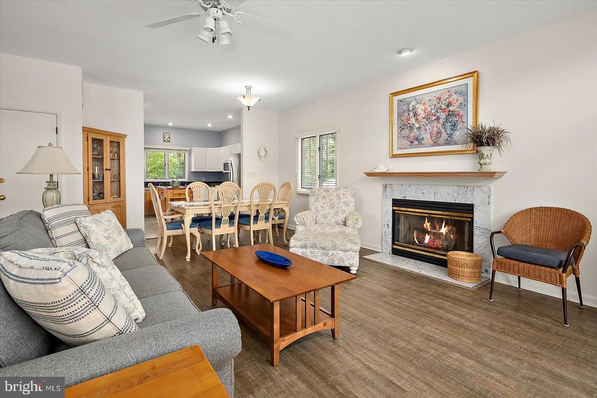 Dining room, Fireplace, Interior, Kitchen, Living room, Recessed Lighting, Wood Texture Flooring