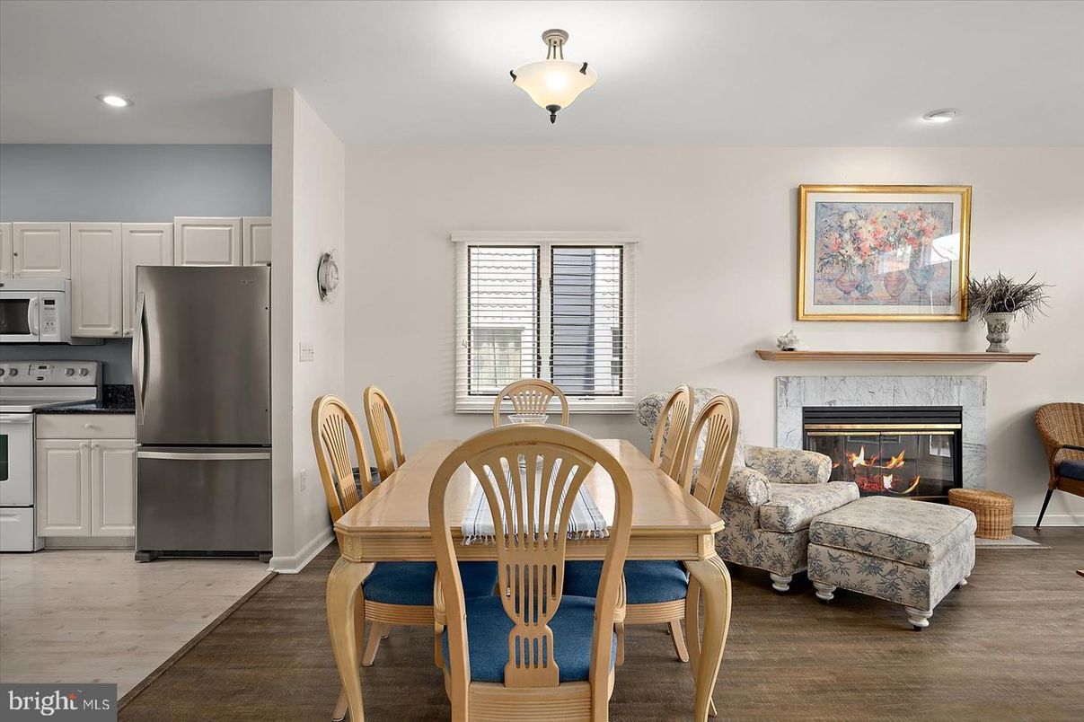 Dining room, Fireplace, Interior, Kitchen, Living room, Recessed Lighting, Wood Texture Flooring