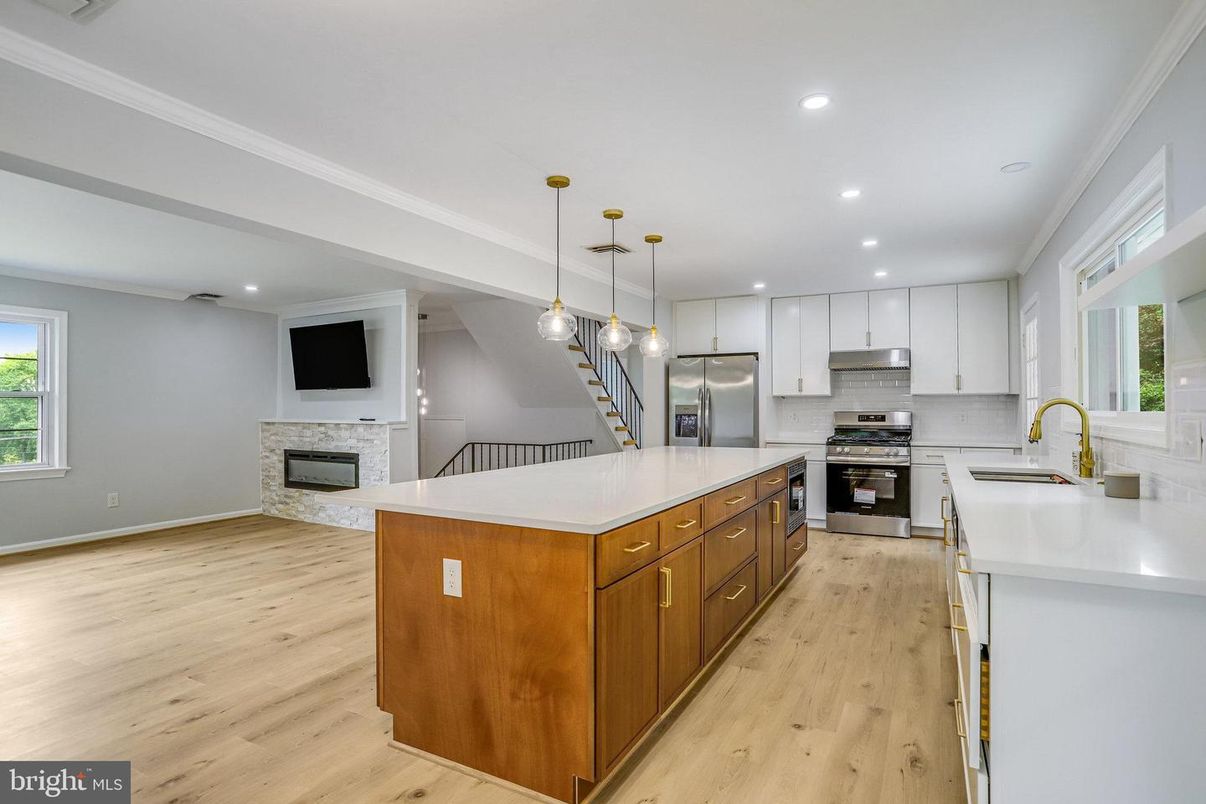 Fireplace, Interior, Kitchen, Pendant Lights, Recessed Lighting, Stainless Steel Appliances, Wood Texture Flooring