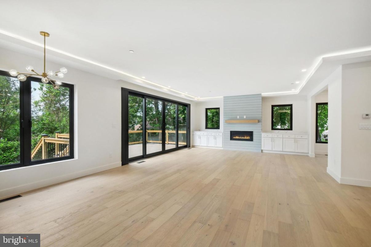 Empty room, Fireplace, Interior, Pendant Lights, Recessed Lighting, Wood Texture Flooring