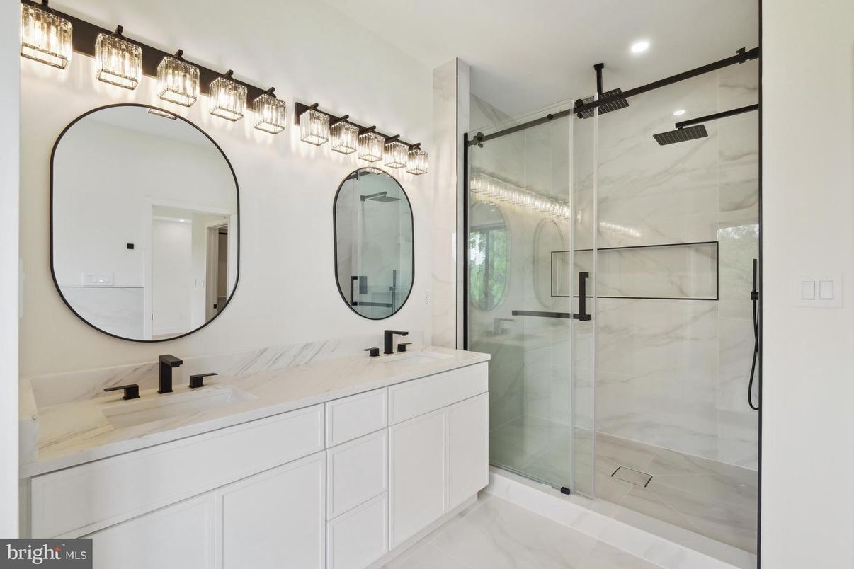 Bathroom, Dual Sink Vanities, Glass Shower, Interior, Marble Walls, Recessed Lighting
