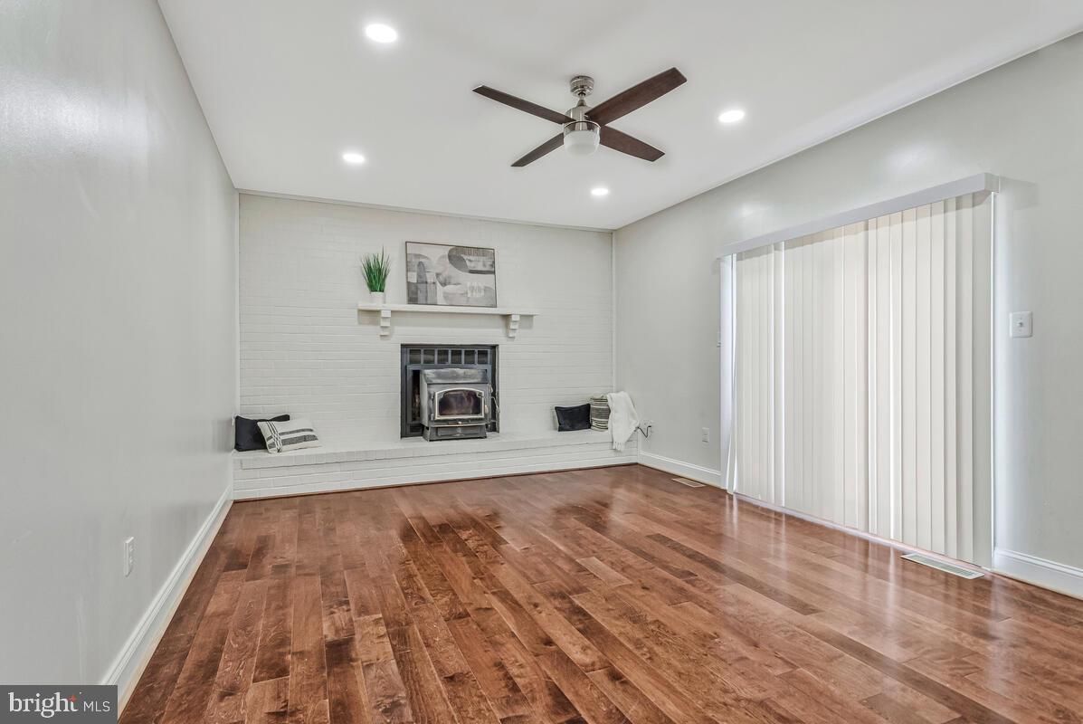 Empty room, Fireplace, Interior, Recessed Lighting, Wood Texture Flooring