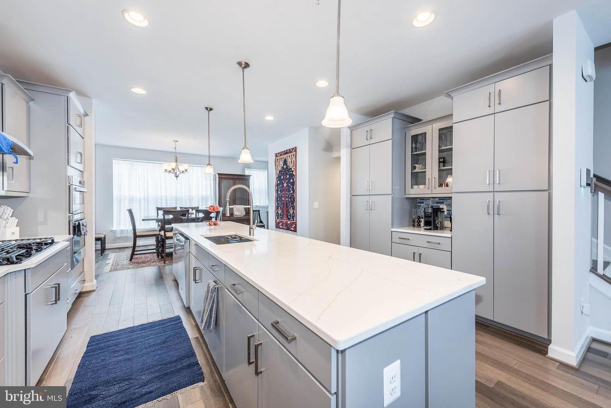 Chandelier, Dining room, Interior, Kitchen, Pendant Lights, Recessed Lighting, Stainless Steel Appliances, Wood Texture Flooring