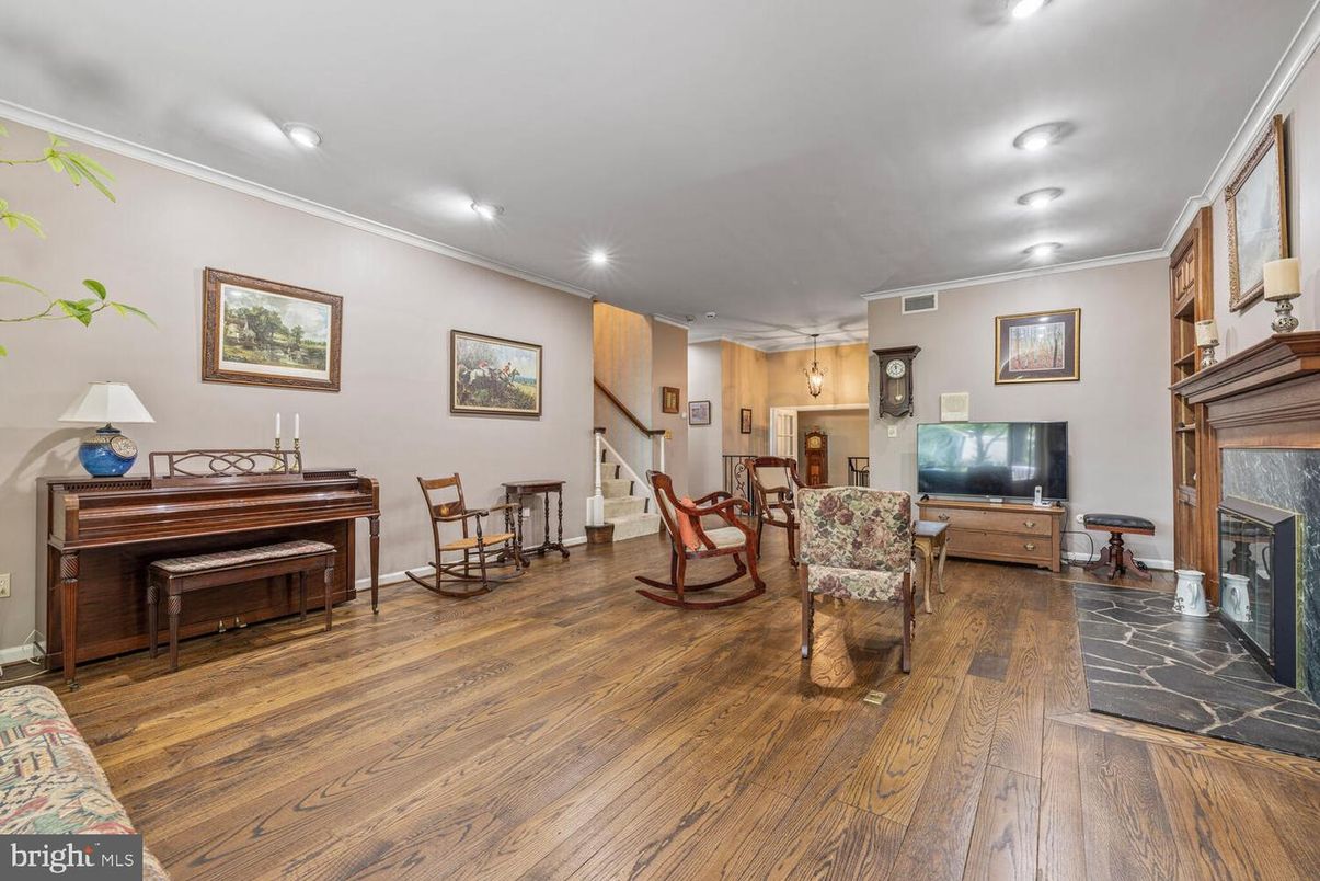 Fireplace, Interior, Living room, Piano, Recessed Lighting, Wood Texture Flooring