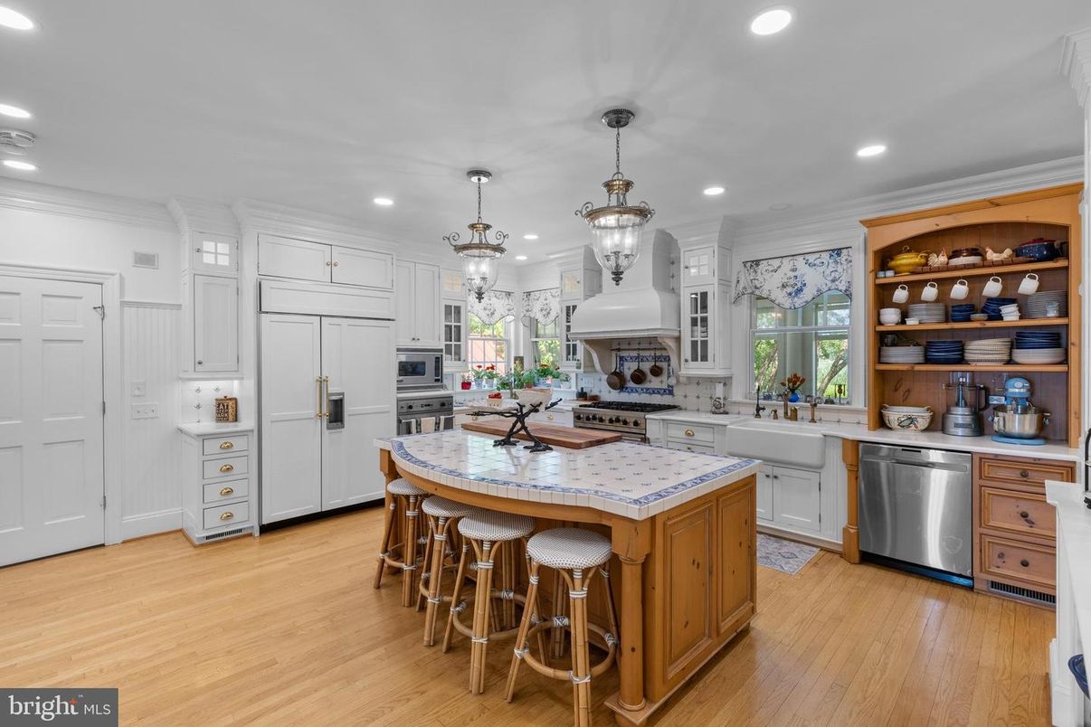 Interior, Kitchen, Pendant Lights, Recessed Lighting, Stainless Steel Appliances, Tile Countertops, Wood Texture Flooring