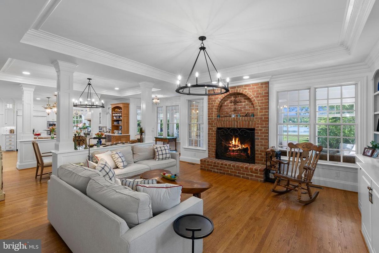 Chandelier, Dining room, Fireplace, Interior, Kitchen, Living room, Pendant Lights, Recessed Lighting, Stone Walls, Wood Texture Flooring