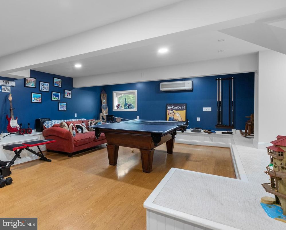 Billiard Table, Fitness Equipment, Game Room, Interior, Living room, Recessed Lighting, Wood Texture Flooring