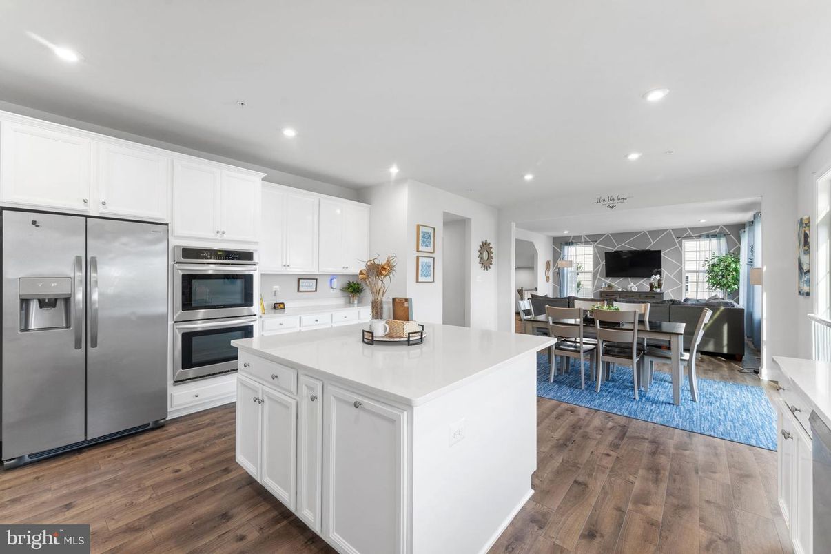 Dining room, Interior, Kitchen, Recessed Lighting, Stainless Steel Appliances, Wood Texture Flooring