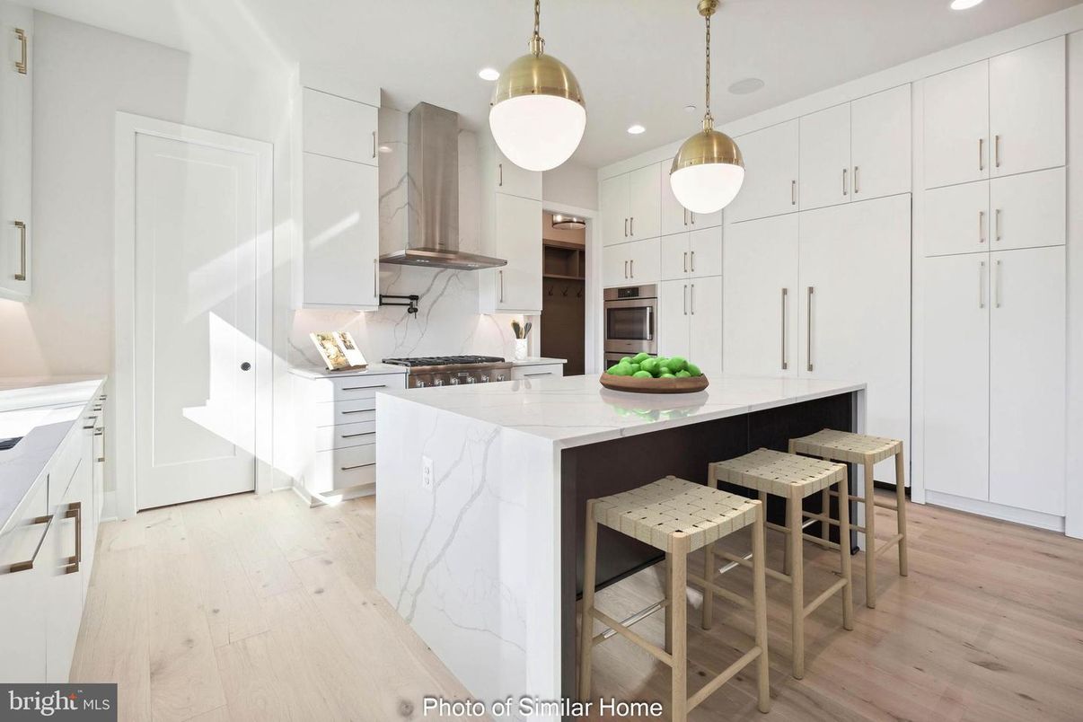 Interior, Kitchen, Marble Walls, Pendant Lights, Recessed Lighting, Wood Texture Flooring
