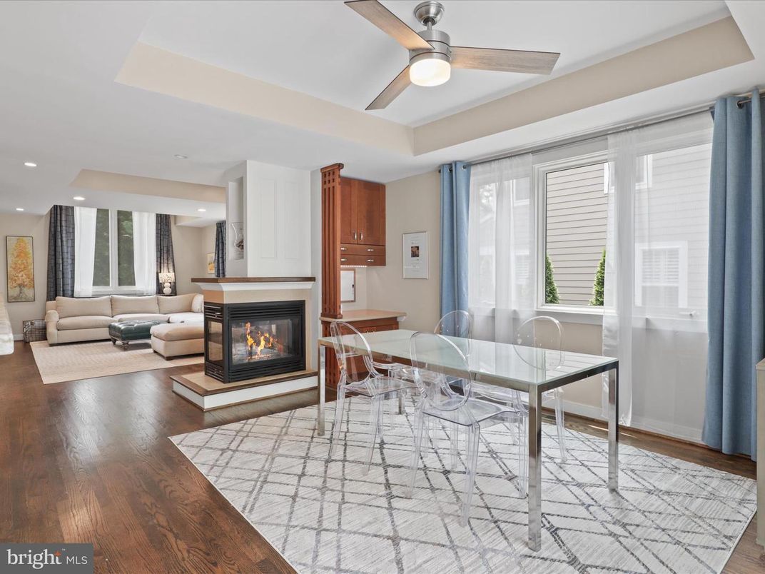 Dining room, Fireplace, Interior, Living room, Recessed Lighting, Wood Texture Flooring