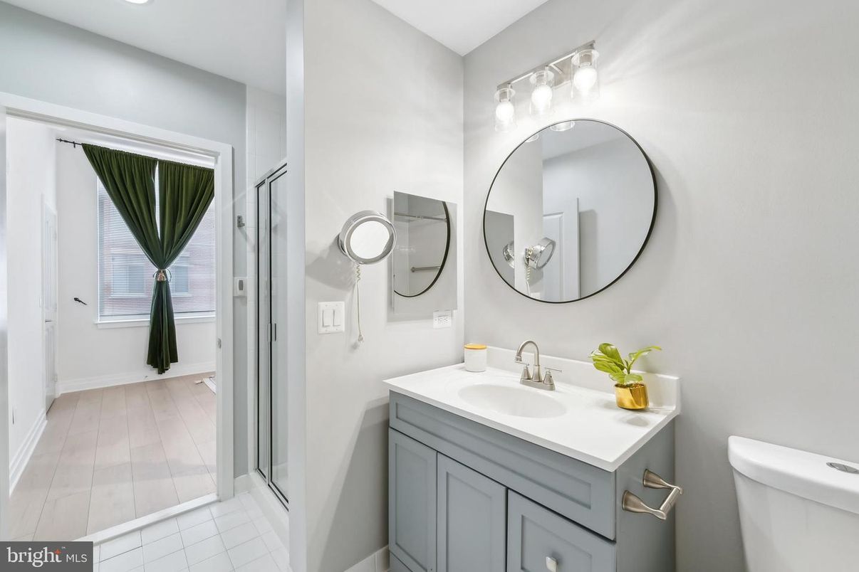 Bathroom, Dual Sink Vanities, Interior, Recessed Lighting, Wood Texture Flooring