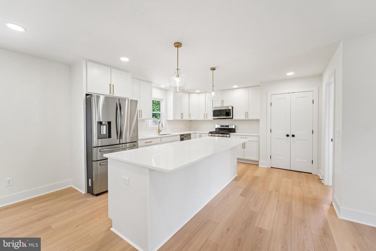 Interior, Kitchen, Pendant Lights, Recessed Lighting, Stainless Steel Appliances, Wood Texture Flooring