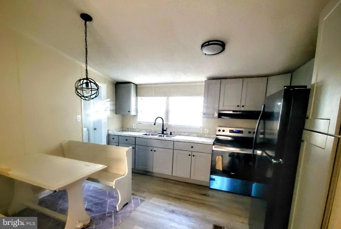 Interior, Kitchen, Pendant Lights, Stainless Steel Appliances, Wood Texture Flooring