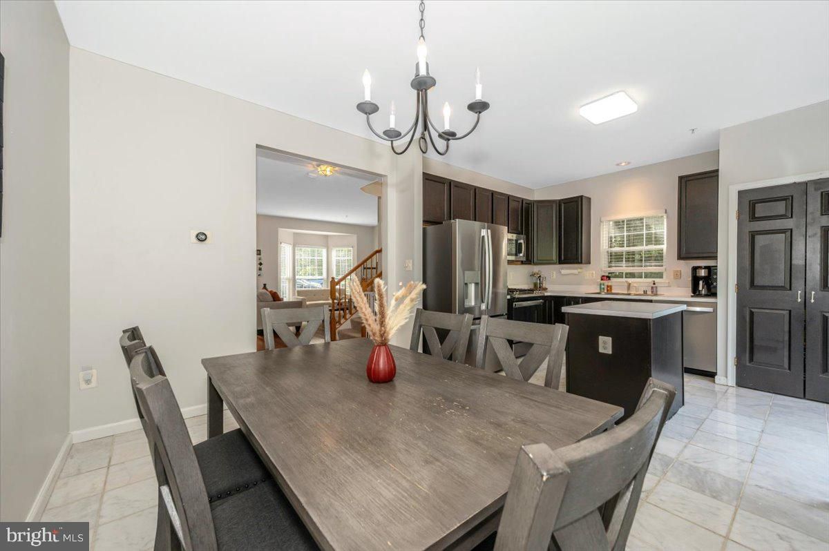 Chandelier, Dining room, Interior, Kitchen, Recessed Lighting, Stainless Steel Appliances