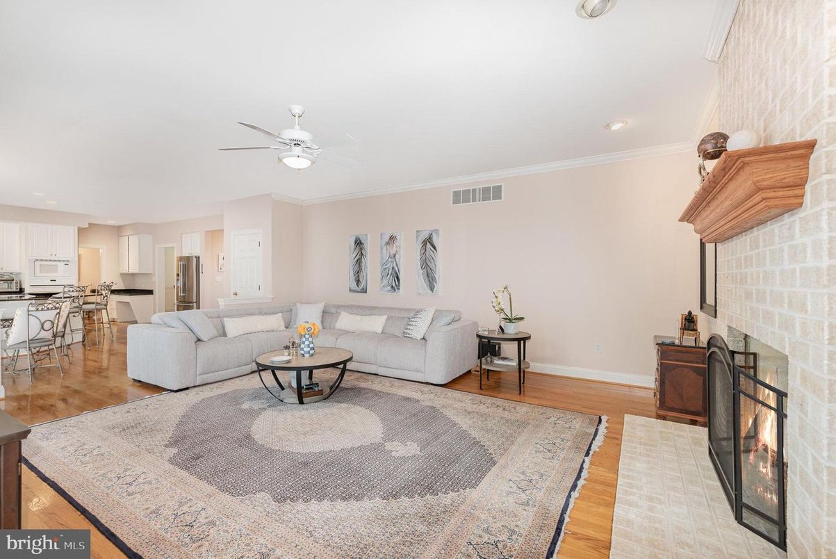 Dining room, Fireplace, Interior, Kitchen, Living room, Recessed Lighting, Stone Walls, Wood Texture Flooring