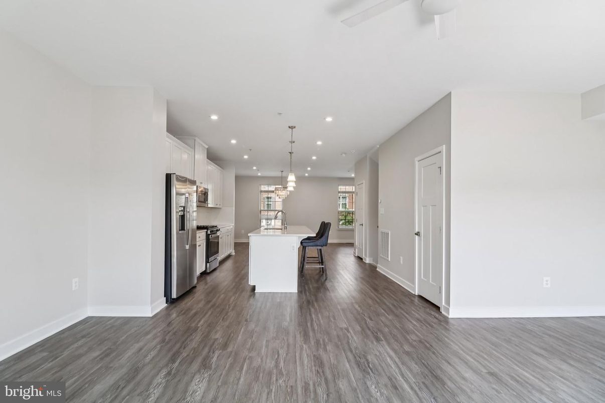 Chandelier, Dining room, Interior, Kitchen, Pendant Lights, Recessed Lighting, Stainless Steel Appliances, Wood Texture Flooring