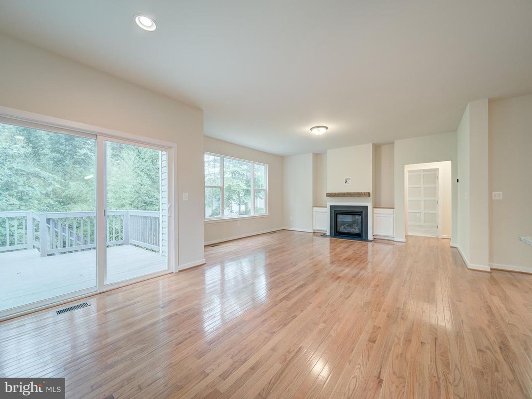 Empty room, Fireplace, Interior, Recessed Lighting, Wood Texture Flooring