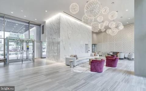 Interior, Living room, Marble Walls, Pendant Lights, Recessed Lighting, Wood Texture Flooring