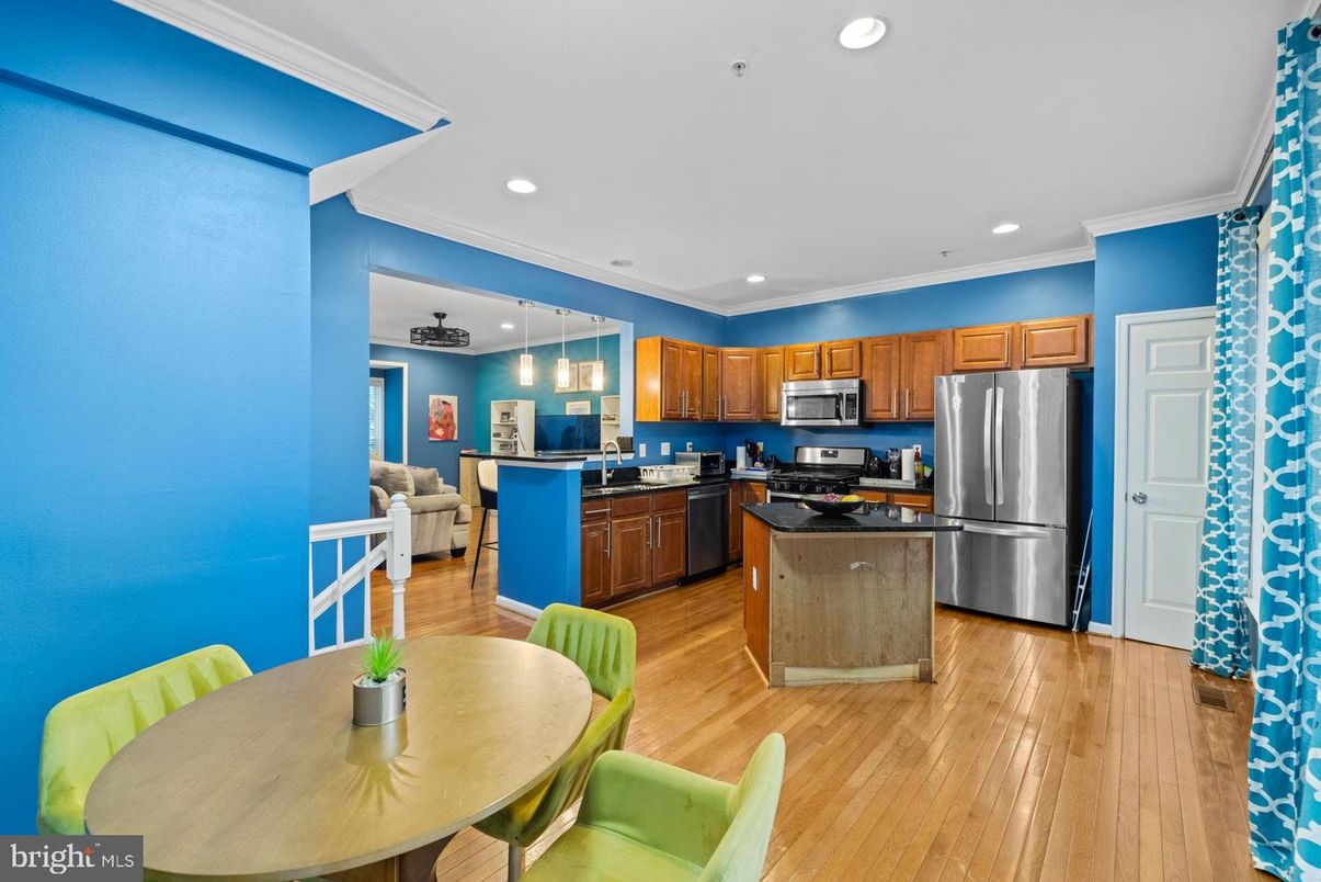 Dining room, Interior, Kitchen, Pendant Lights, Recessed Lighting, Stainless Steel Appliances, Wood Texture Flooring