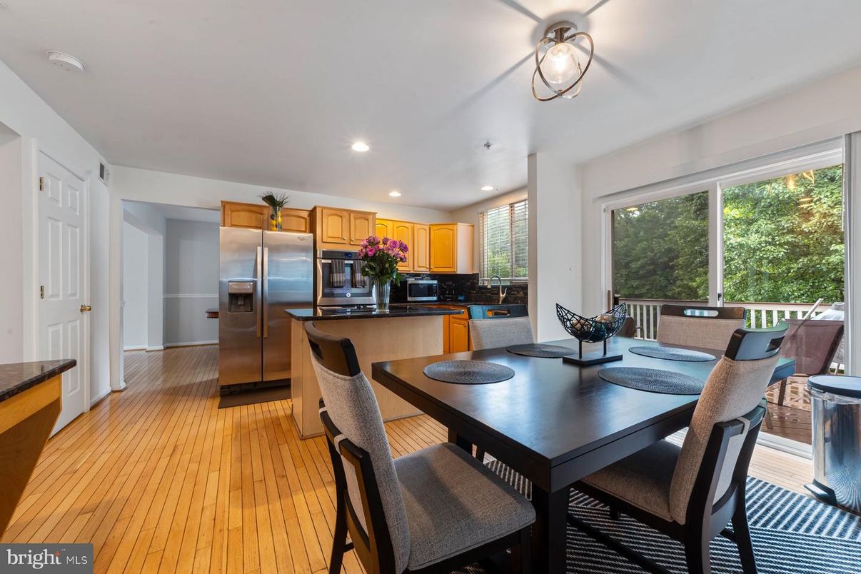 Dining room, Interior, Kitchen, Recessed Lighting, Stainless Steel Appliances, Wood Texture Flooring