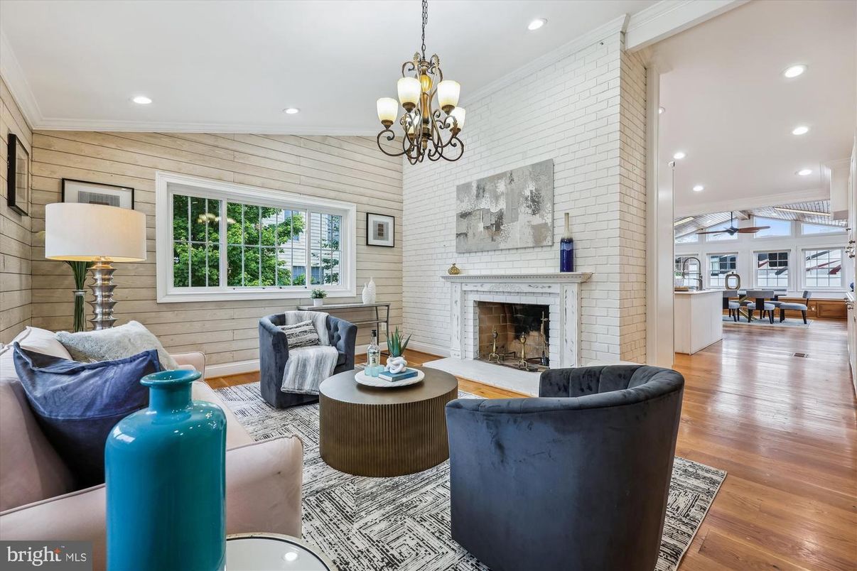 Chandelier, Dining room, Fireplace, Interior, Living room, Recessed Lighting, Stone Walls, Wood Texture Flooring