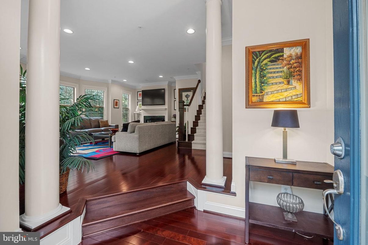 Fireplace, Interior, Living room, Piano, Recessed Lighting, Wood Texture Flooring