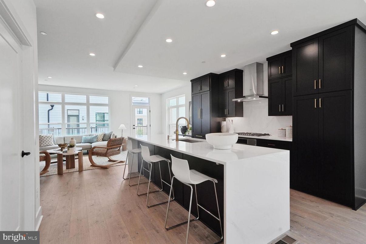 Dining room, Interior, Kitchen, Living room, Recessed Lighting, Stainless Steel Appliances, Wood Texture Flooring