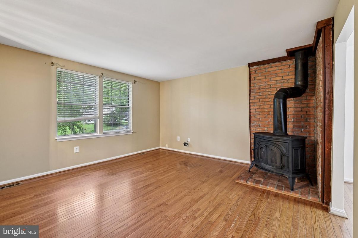 Empty room, Fireplace, Interior, Stone Walls, Wood Texture Flooring