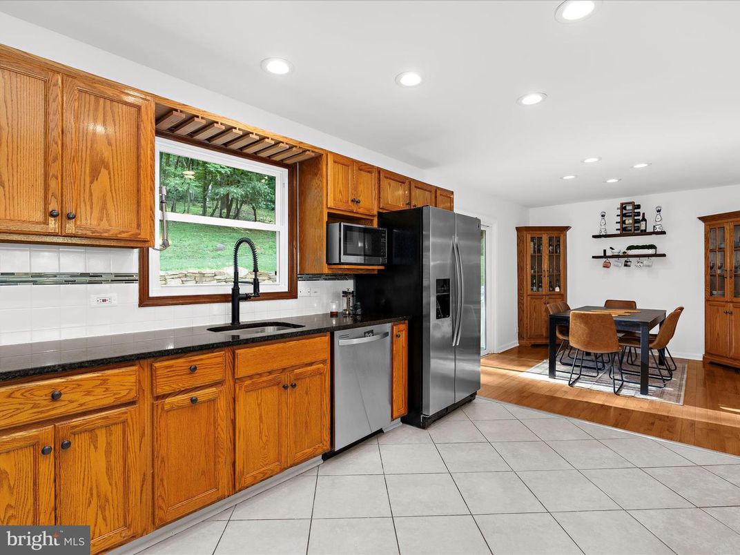 Dining room, Interior, Kitchen, Recessed Lighting, Stainless Steel Appliances, Wood Texture Flooring